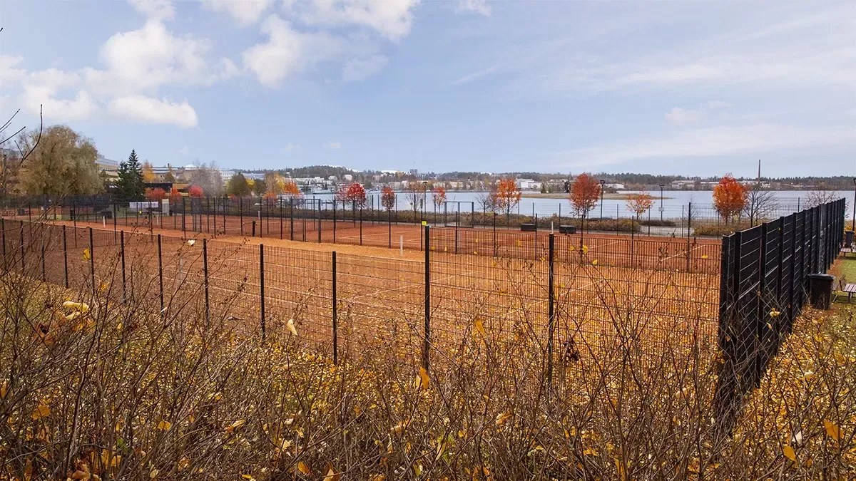 Artificial grass court fencing